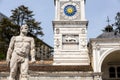 UDINE, ITALY, MAY 27, 2020: The Hercules statue and the Clock Tower at Piazza LibertÃÂ  in Udine Royalty Free Stock Photo